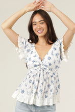 Load image into Gallery viewer, 6082- Eyelet Embroidery Ruffle Trim Twist Front Top-SHORT SLV
