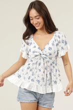 Load image into Gallery viewer, 6082- Eyelet Embroidery Ruffle Trim Twist Front Top-SHORT SLV
